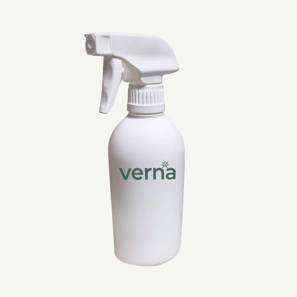 White spray bottle with 'verna' branding on a white background