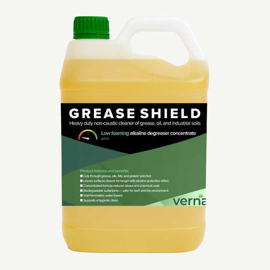 Yellow bottle of Grease Shield cleaner by Verna with a green cap on a white background.