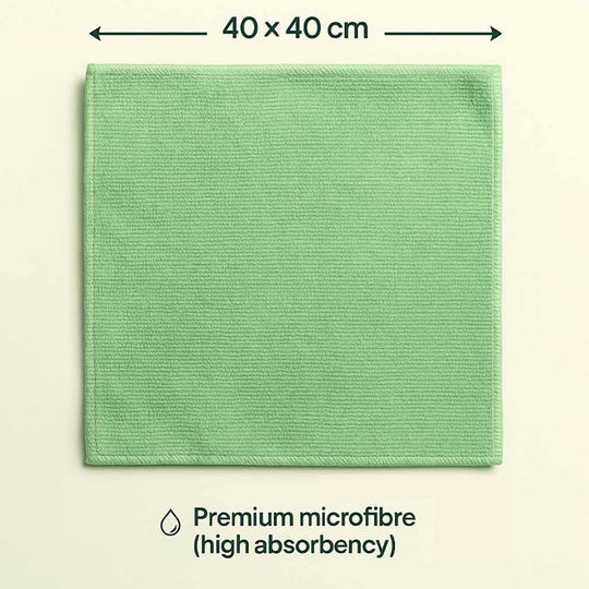 Green microfiber cloth with dimensions 40x40 cm on a beige background